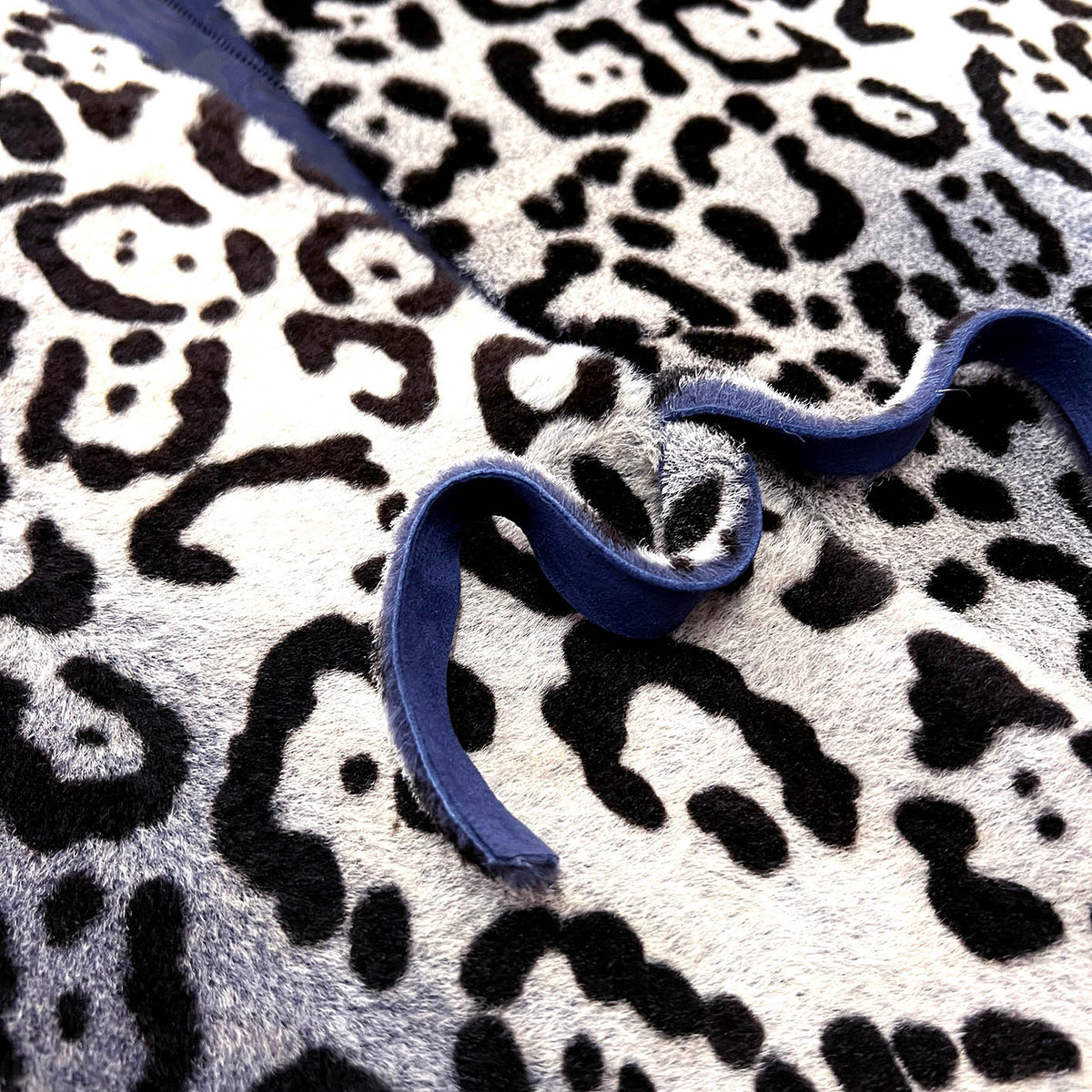 TAIGA Sheepskin Waistcoat - Stone + Black Animal Print / Textured Blue