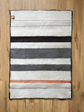 STRIPE THROW / PALE GREY WITH ORANGE ACCENT
