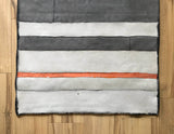 STRIPE THROW / PALE GREY WITH ORANGE ACCENT